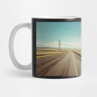 Canadian prairie landscape with a country road near Pincher Creek, Alberta, Canada. Mug